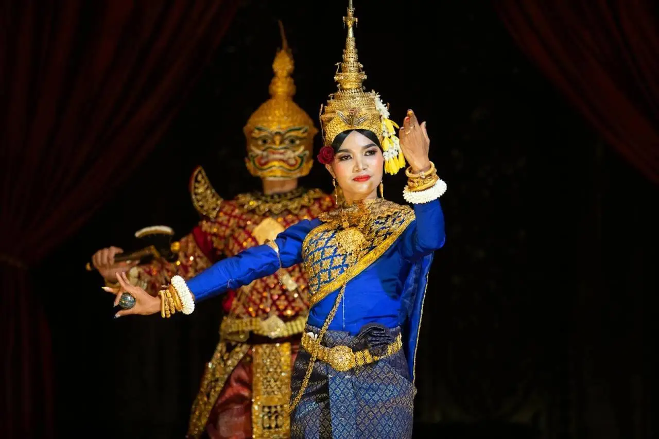 Colorful Apsara dancers performing traditional Khmer dance in Siem Reap, Cambodia.